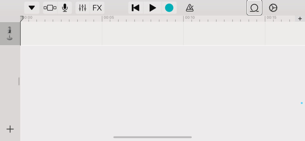 Zrzut ekranu - Widok po otwarciu aplikacji GarageBand. Fokus VoiceOver na przycisku Pętle.